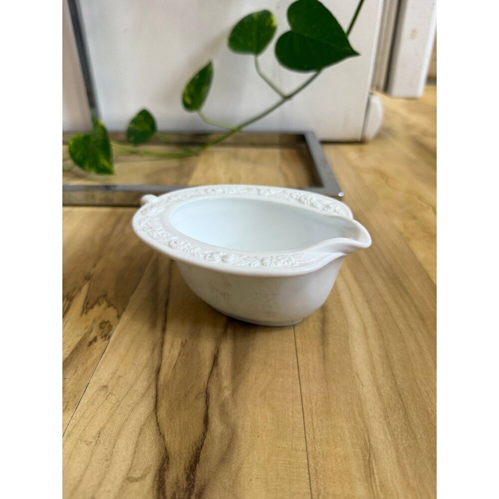 Vintage White Ceramic Gravy Boat with Floral Embossed Rim
